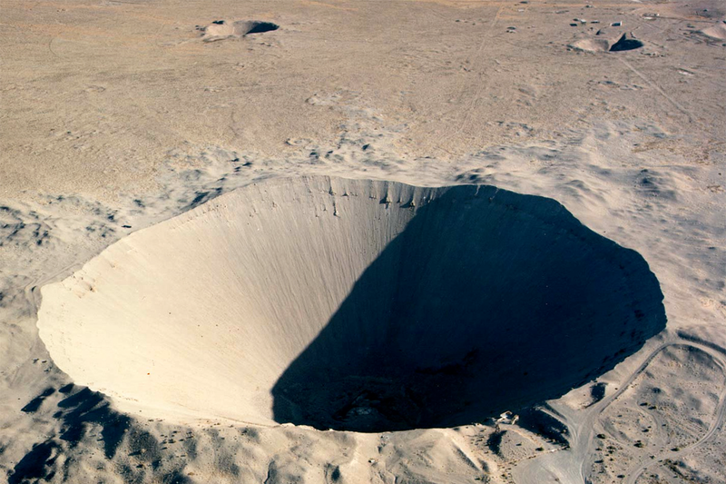 Illustration for article titled These 21 Enormous Man Made Holes Will Give You Vertigo